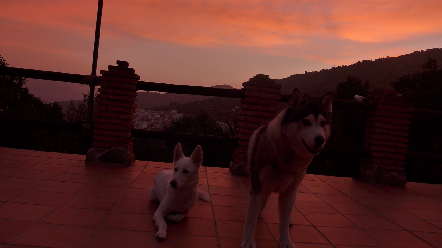 Khumbu and Rita enjoying the strange light produced by the sunset